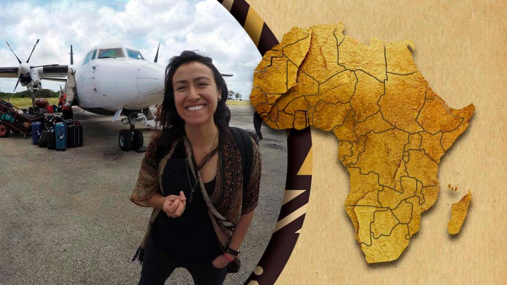Picture of Juanita Rodríguez in an airport with Africa's illustrated map